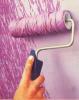 Tie yarn around a paint roller for an awesome effect